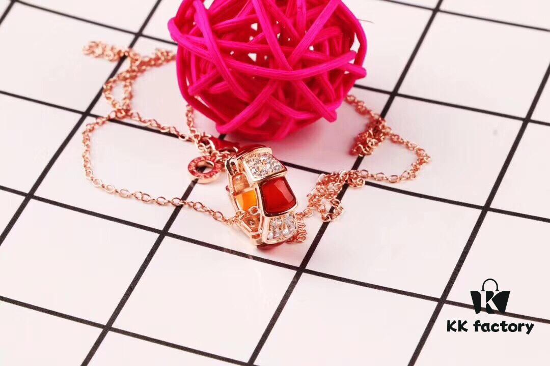 692fc3f599f2d84055c88740 Bulgari BVLGARI 2018 Red Agate and White Agate Diamond-Paved Snake Bone Pendant Necklace