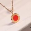 692fc3f599f2d84055c88741 Bvlgari Double-Sided Pendant Necklace with Natural Stone – One Side Red Agate, One Side White Mother-of-Pearl