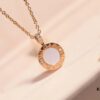 692fc3f699f2d84055c88742 Bvlgari Double-Sided Pendant Necklace with Natural Stone – One Side Red Agate, One Side White Mother-of-Pearl