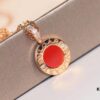 692fc3f699f2d84055c88744 Bvlgari Double-Sided Pendant Necklace with Natural Stone – One Side Red Agate, One Side White Mother-of-Pearl
