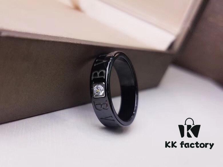 692fc41299f2d84055c88772 BVLGARI Bulgari Couple's Black Ceramic Ring with 925 Silver Setting and Simulated Diamonds