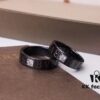 692fc41399f2d84055c88774 BVLGARI Bulgari Couple's Black Ceramic Ring with 925 Silver Setting and Simulated Diamonds