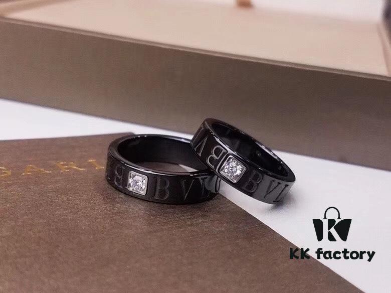 692fc41399f2d84055c88774 BVLGARI Bulgari Couple's Black Ceramic Ring with 925 Silver Setting and Simulated Diamonds