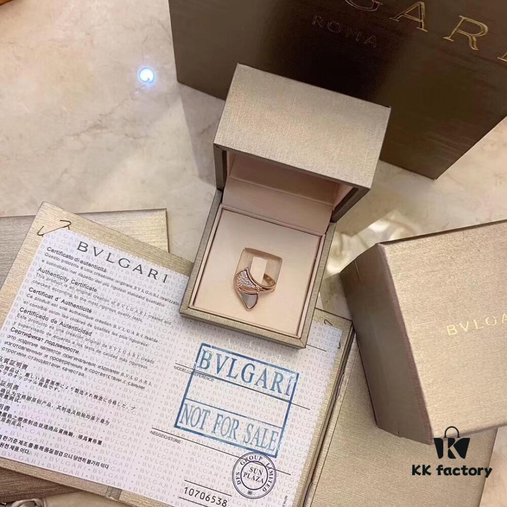 692fc49799f2d84055c88879 BVLGAR Classic Revival Bulgari Mother-of-Pearl Skirt Ring with Snake-Inspired Design, Adjustable, 925 Sterling Silver Thick Gold Plated, Natural Mother-of-Pearl, Diamond-Cut Detail, Available in Platinum and Rose Gold Finish