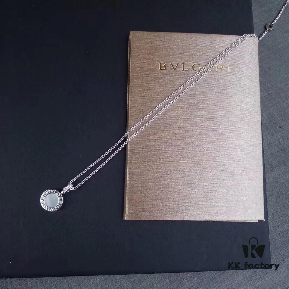 692fc50399f2d84055c88916 BVLGARI Bulgari Classic Reversible Black and White Ceramic Necklace with Mother-of-Pearl and Onyx