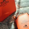692fc83899f2d84055c88ed1 Hermes Titanium Steel with Natural White Shell Narrow Bracelet - Classic Design