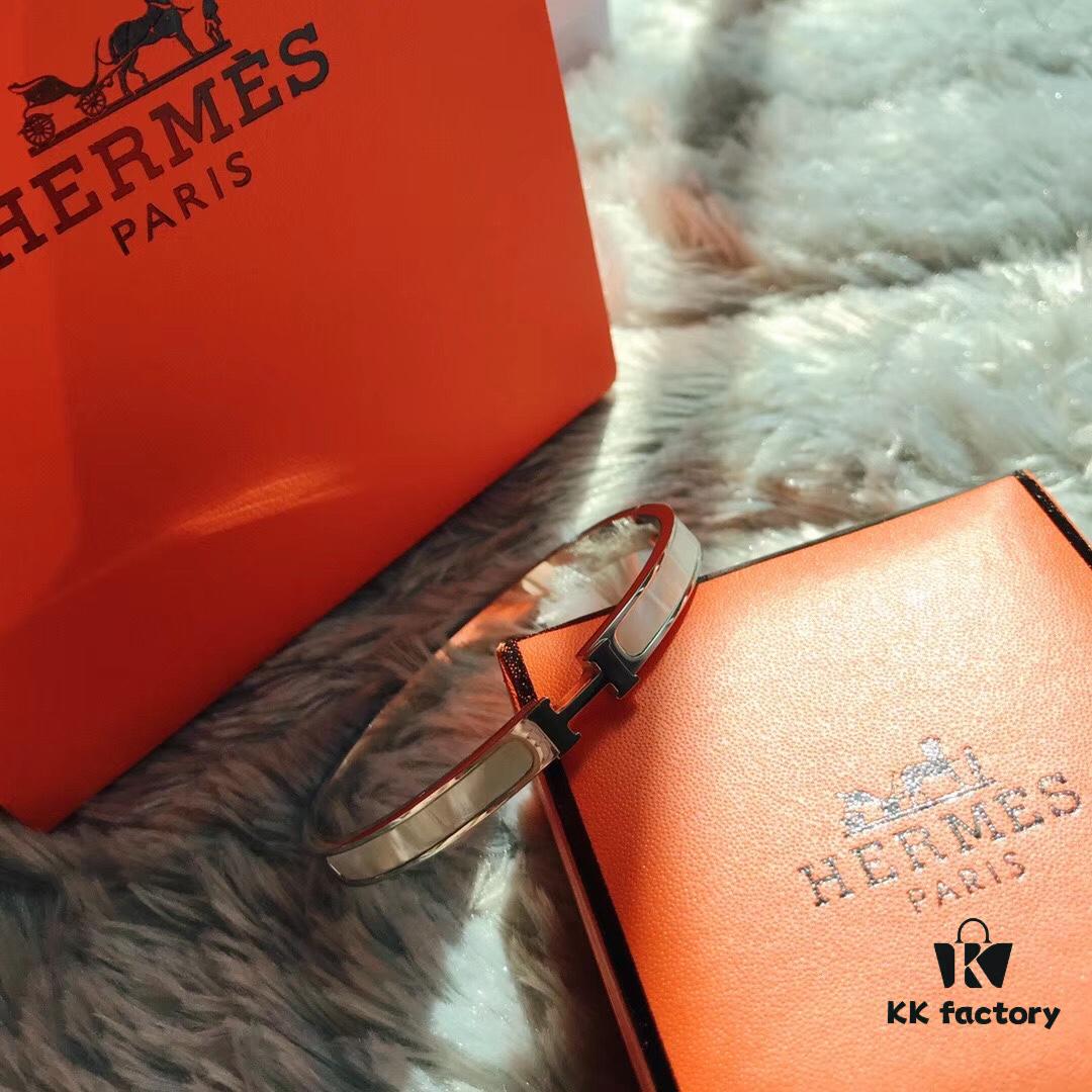 692fc83899f2d84055c88ed1 Hermes Titanium Steel with Natural White Shell Narrow Bracelet - Classic Design