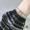 692fc83999f2d84055c88ed3 Hermes Titanium Steel with Natural White Shell Narrow Bracelet - Classic Design