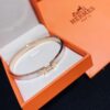 692fc83a99f2d84055c88ed4 Hermes Titanium Steel with Natural White Shell Narrow Bracelet - Classic Design
