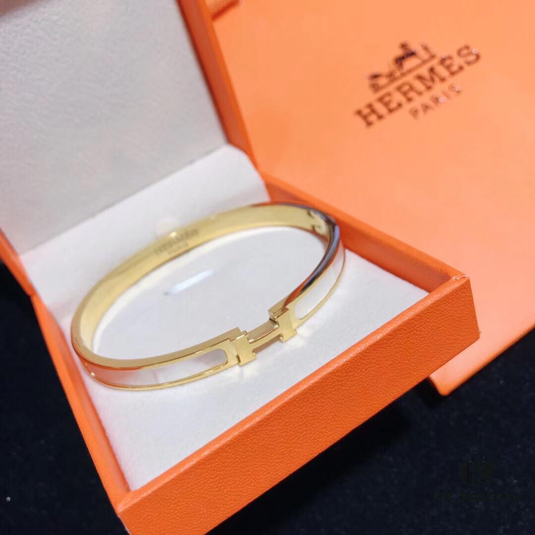 692fc83c99f2d84055c88ed7 Hermes Titanium Steel with Natural White Shell Narrow Bracelet - Classic Design