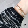 692fc84299f2d84055c88ee2 Hermes Titanium Steel with Natural White Shell Narrow Bracelet - Classic Design