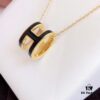 692fc84d99f2d84055c88ef9 Hermès Enamel Curved H Necklace in Gold Tones
