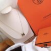 692fc85b99f2d84055c88f08 Hermès Enamel Curved H Necklace in Gold Tones