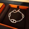 692fc8d099f2d84055c88fd9 Hermes Farandole Gold-Plated Pig Nose Bracelet