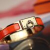 692fcad899f2d84055c89349 New Arrival H Bracelet Series Inspired by Hermès Circle and Padlock Design with Enamel Craftsmanship