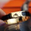 692fcada99f2d84055c8934d New Arrival Hermes-Inspired Enamel Bracelet with H Lock Closure
