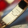 692fcade99f2d84055c89356 New Arrival Hermes-Inspired Enamel Bangle Bracelet with H Lock Design