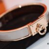 692fcae099f2d84055c89358 New Arrival Hermes-Inspired Enamel Bangle Bracelet with H Lock Clasp, Authentic Cloisonné Craftsmanship, 1μ Gold Plating, Lightweight Design at 36g