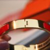 692fcafb99f2d84055c89386 New Arrival Hermes-Inspired Enamel Bangle Bracelet with H Lock Design