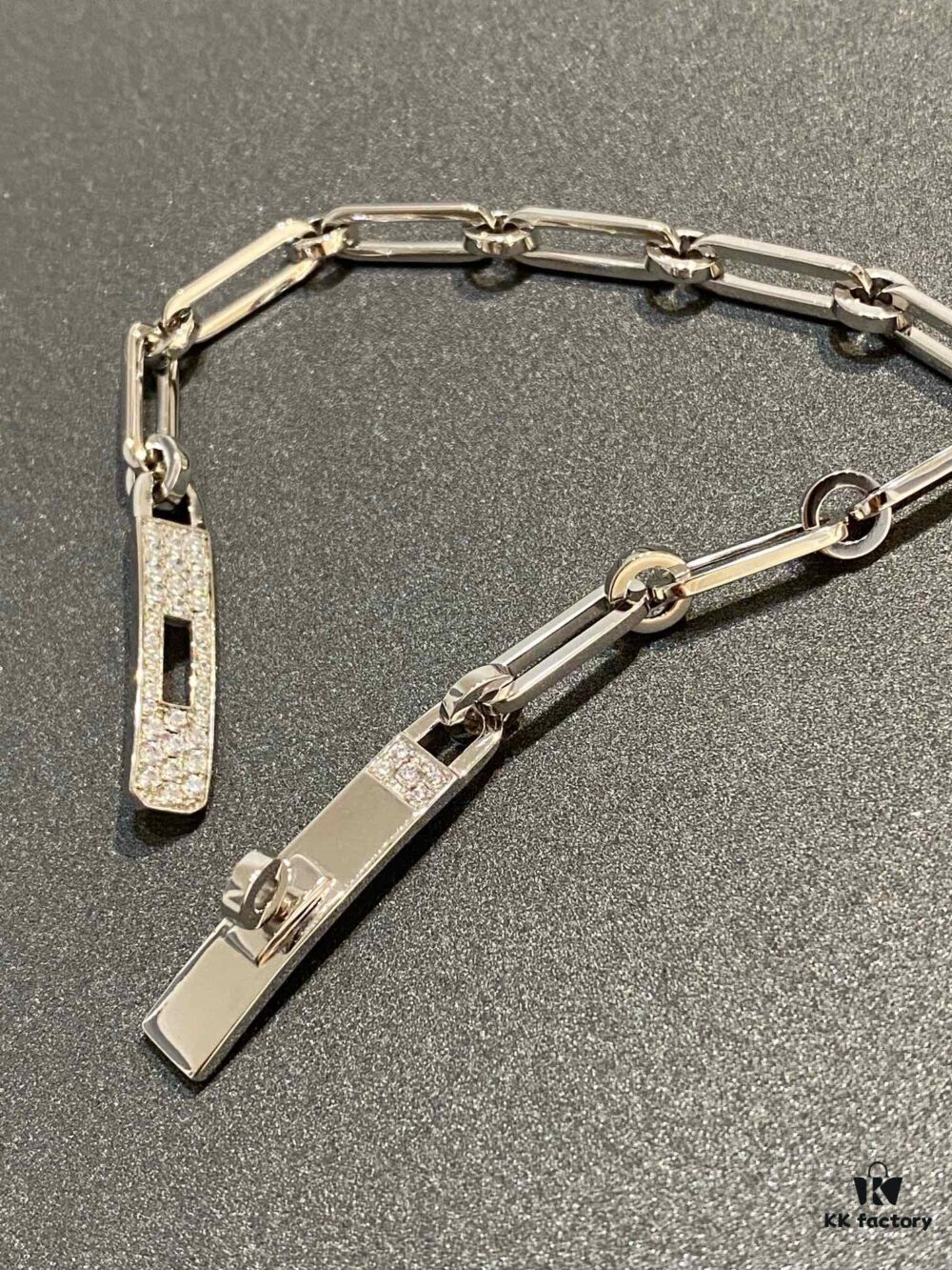 692fcb4399f2d84055c8940e Hermes New Kelly Chaine Square Openwork Bracelet