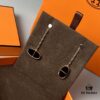 692fcbc899f2d84055c8950e Hermes Chaine d'Ancre Verso Asymmetric Pig Nose Earrings in Yellow Gold, Rose Gold, and Black Ceramic