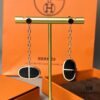 692fcbc999f2d84055c89510 Hermes Chaine d'Ancre Verso Asymmetric Pig Nose Earrings in Yellow Gold, Rose Gold, and Black Ceramic