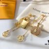 692fcc9c99f2d84055c896b0 Louis Vuitton Boite Chapeau Bag in Monogram Canvas and Gold-Tone Metal, Adorning Mini LV Asymmetrical Earrings