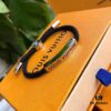 692fccab99f2d84055c896cd Louis Vuitton LV Monogram Leather Bracelet - Premium Replica, Authentic Brass Hardware, Adjustable Calfskin Interior, Four Classic Patterns, Unisex Design