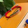 692fccb699f2d84055c896e3 Louis Vuitton LV Monogram Leather Bracelet - Premium Replica, Authentic Brass Hardware, Adjustable Calfskin Interior, Four Classic Patterns, Unisex Design