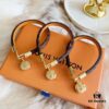 692fccd699f2d84055c89723 Louis Vuitton LV Monogram Double Leather Strap Bag Bracelet Wristband, Brass Hardware, Calfskin Lining, Vintage and Avant-garde Design, Must-have for Women