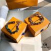 692fccd899f2d84055c89726 LV by Virgil Abloh Monogram Limited Edition Bracelet, Unisex Design, Stainless Steel with Colorful Chain Links and Engraved Logo Detail