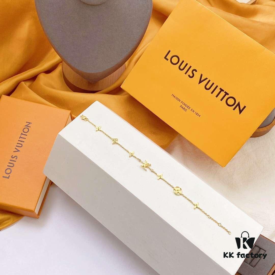 692fcce399f2d84055c89742 LV Gold-Tone Letter and Flower Bracelet