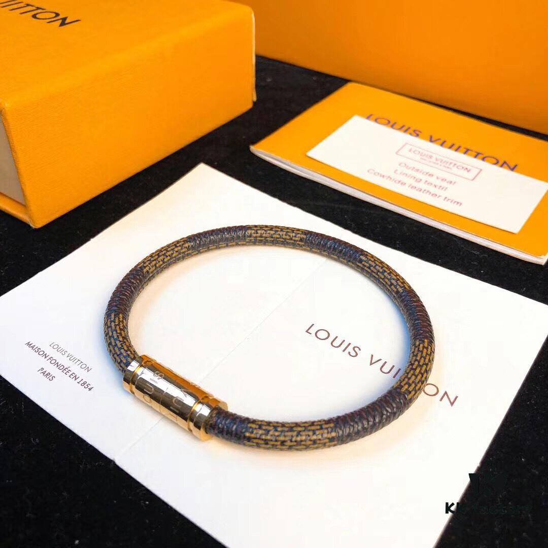 692fcd2a99f2d84055c897d5 Louis Vuitton LV Monogram Leather Bracelet ● Authentic Replica, Best Quality on Market, Brass Hardware, Calfskin Lining, Unique Retro-Futuristic Design, Must-Have for Women