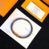 692fcd2b99f2d84055c897d7 Louis Vuitton LV Monogram Leather Bracelet ● Authentic Replica, Best Quality on Market, Brass Hardware, Calfskin Lining, Unique Retro-Futuristic Design, Must-Have for Women