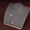 692fcd8199f2d84055c89869 LV Microphone Necklace 🎤 Featuring the DJ-inspired design by former Men's Artistic Director Virgil Abloh, this pendant captures the essence of music culture with a finely etched microphone charm and delicately suspended LV initials on a sleek chain. Metal hardware, microphone-shaped pendant, LV letter detailing—perfect for gifting or personal wear!