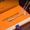 692fcd8299f2d84055c8986a LV Microphone Necklace 🎤 Featuring the DJ-inspired design by former Men's Artistic Director Virgil Abloh, this pendant captures the essence of music culture with a finely etched microphone charm and delicately suspended LV initials on a sleek chain. Metal hardware, microphone-shaped pendant, LV letter detailing—perfect for gifting or personal wear!