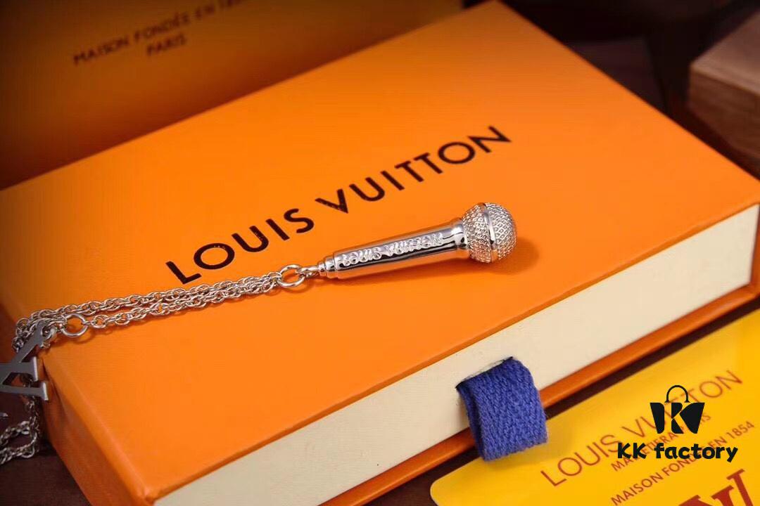 692fcd8299f2d84055c8986b LV Microphone Necklace 🎤 Featuring the DJ-inspired design by former Men's Artistic Director Virgil Abloh, this pendant captures the essence of music culture with a finely etched microphone charm and delicately suspended LV initials on a sleek chain. Metal hardware, microphone-shaped pendant, LV letter detailing—perfect for gifting or personal wear!