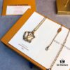 692fce2499f2d84055c899c2 LV Circle Pendant Suspends Gracefully Within Interwoven Lines of the Exquisitely Crafted Metal Chain, Infusing the Garden Louise Long Necklace with Artistic Elegance