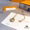692fce3199f2d84055c899d5 LV Circle Pendant Suspends Gracefully Within Interwoven Lines of the Exquisitely Crafted Metal Chain, Infusing the Garden Louise Long Necklace with Artistic Elegance