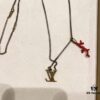 692fce4c99f2d84055c899fa Louis Vuitton LV Pendant Necklace with Red Coral and Logo, Couples Style, One-to-One Craftsmanship