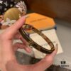 692fcec199f2d84055c89acc LV Monogram Canvas Leather and Calfskin Inlaid Bangle Bracelet