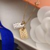 692fcf2c99f2d84055c89b86 LV Nanogram Pendant Necklace, Recommended by Influencers! Two-Tone Mini Pendant with Beaded Chain, Featuring LV Logo and Monogram Pattern, Asymmetric Layered Design, Elegant and Stylish, Reversible Wear, Perfect as a Necklace or Collarbone Chain, Ideal for Layering