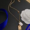 692fcf2d99f2d84055c89b88 LV Nanogram Pendant Necklace, Recommended by Influencers! Two-Tone Mini Pendant with Beaded Chain, Featuring LV Logo and Monogram Pattern, Asymmetric Layered Design, Elegant and Stylish, Reversible Wear, Perfect as a Necklace or Collarbone Chain, Ideal for Layering