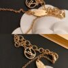 692fcf3099f2d84055c89b8d LV Nanogram Pendant Necklace, Recommended by Influencers! Two-Tone Mini Pendant with Beaded Chain, Featuring LV Logo and Monogram Pattern, Asymmetric Layered Design, Elegant and Stylish, Reversible Wear, Perfect as a Necklace or Collarbone Chain, Ideal for Layering