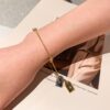 692fcf5899f2d84055c89bc9 LV Unisex Nanogram Dual-Pendant Necklace Bracelet
