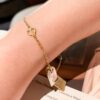 692fcf5999f2d84055c89bca LV Unisex Nanogram Dual-Pendant Necklace Bracelet