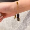 692fcf6c99f2d84055c89be8 LV Unisex Nanogram Dual-Pendant Necklace Bracelet