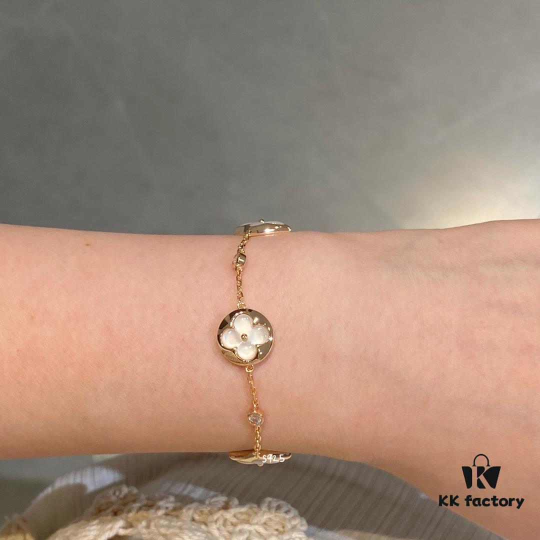 692fcfb399f2d84055c89c70 Four-flower bracelet, a fairy-like jewelry piece that's beautiful worn alone and doesn't require layeringâeconomical and elegant!