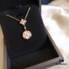 692fcfc399f2d84055c89c93 Exquisitely Crafted ZP LV Jewelry with Classic Floral Design, White Shell, Pink Rhombus Shell, and Accented with a Small Diamond