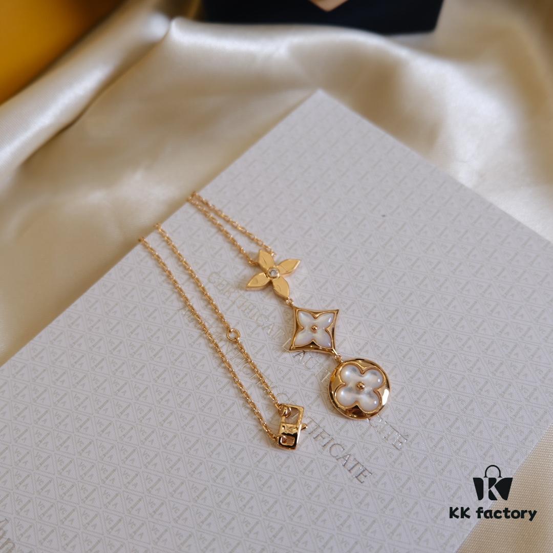 692fcfc999f2d84055c89c9e Exquisite ZP LV Jewelry with Classic Flower Design, White and Pink Mother-of-Pearl Inlay, Accented with a Small Diamond, Made in V Gold with Sterling Silver Chain